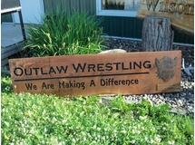 Outlaw Wrestling sign 